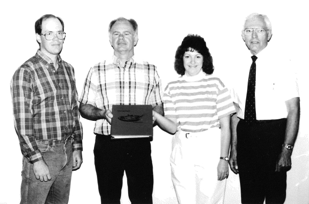 DAVID REED, Rooks County Farm Bureau, presented the 1991 Ag in the Classroom computer program called “Animal Agriculture” to the Stockton Grade School.Accepting the award were fifthgrade teachers Don LaRue and Ginger Kollman along with Principal Francis Mahoney.