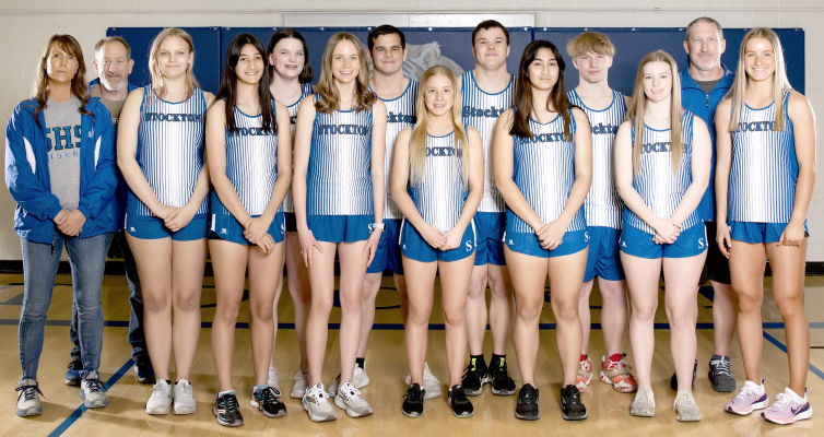 MEMBERS OF THE 2024 STOCKTON HIGH SCHOOL TRACK TEAM include, from left: Coach Janet Kuhlmann, Coach Justin Basart, Paytyn McNulty, Jalia Creighton, MacKenzie Kester, Cheyenne Hoeting, Preston Chandler, Saj Snyder, Zach Young, Jayana Creighton, Isaac Thayer, Katlyn Couse, Coach Clint Bedore and Ava Dix. (Photo Courtesy of Bobbi Basart)