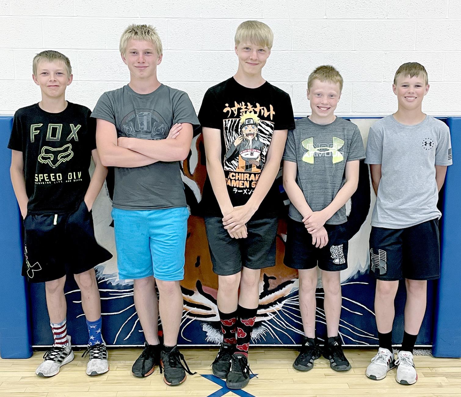 THE STOCKTON JUNIOR HIGH SEVENTH-GRADE BOYS placed fourth as a team at the MCEL Track Meet. Individuals scoring points for the Tigers were from left: Cameron Earl (100MH, 200MH, 4 x 100M Relay, 4 x 200M Relay), Isaac Thayer (100M, Long Jump, 4 x 100M Relay, 4 x 200M Relay), Pierce Gray (100M, 200M, 4 x 100M Relay), Zeke Balthazor (4 x 100M Relay, 4 x 200M Relay) and Jace Kesler (4 x 200M Relay). (Courtesy Photo)