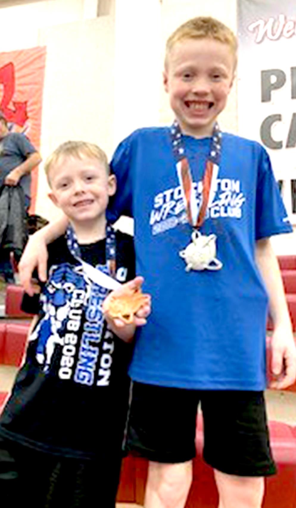 BROTHERS BLAKE AND ZEKE BALTHAZOR recently competed in the Plainville Open/Novice Wrestling Tournament Saturday, February 8th, at Plainville. Blake (left) placed 4th in the 6 &amp; Under 43A-lb. division, while Zeke (right) placed 2nd in the 10 &amp; Under 64-67-lb. division.