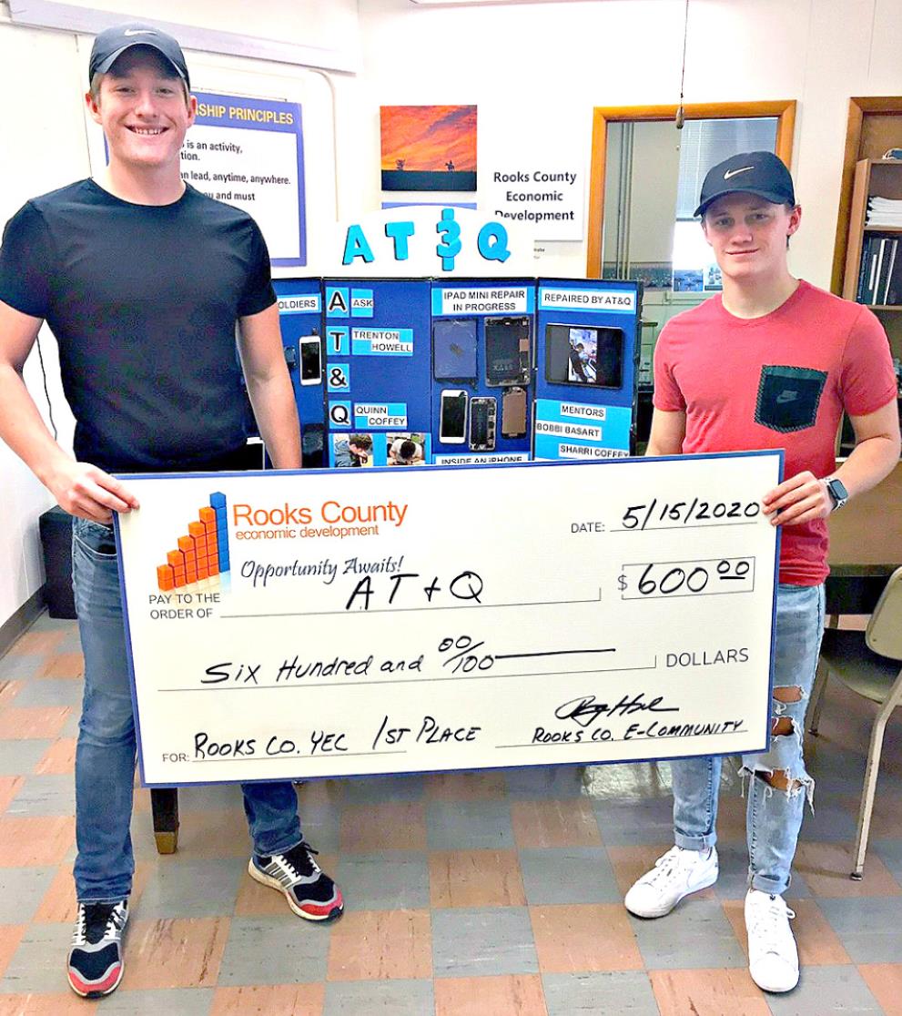 FOR THE SECOND YEAR IN A ROW, Quinn Coffey and Trenton Howell of Stockton High School, with AT&amp;Q, won the Rooks County Youth Entrepreneurship Challenge. They received a check for $600 for their concept as a technology software/hardware repair business.