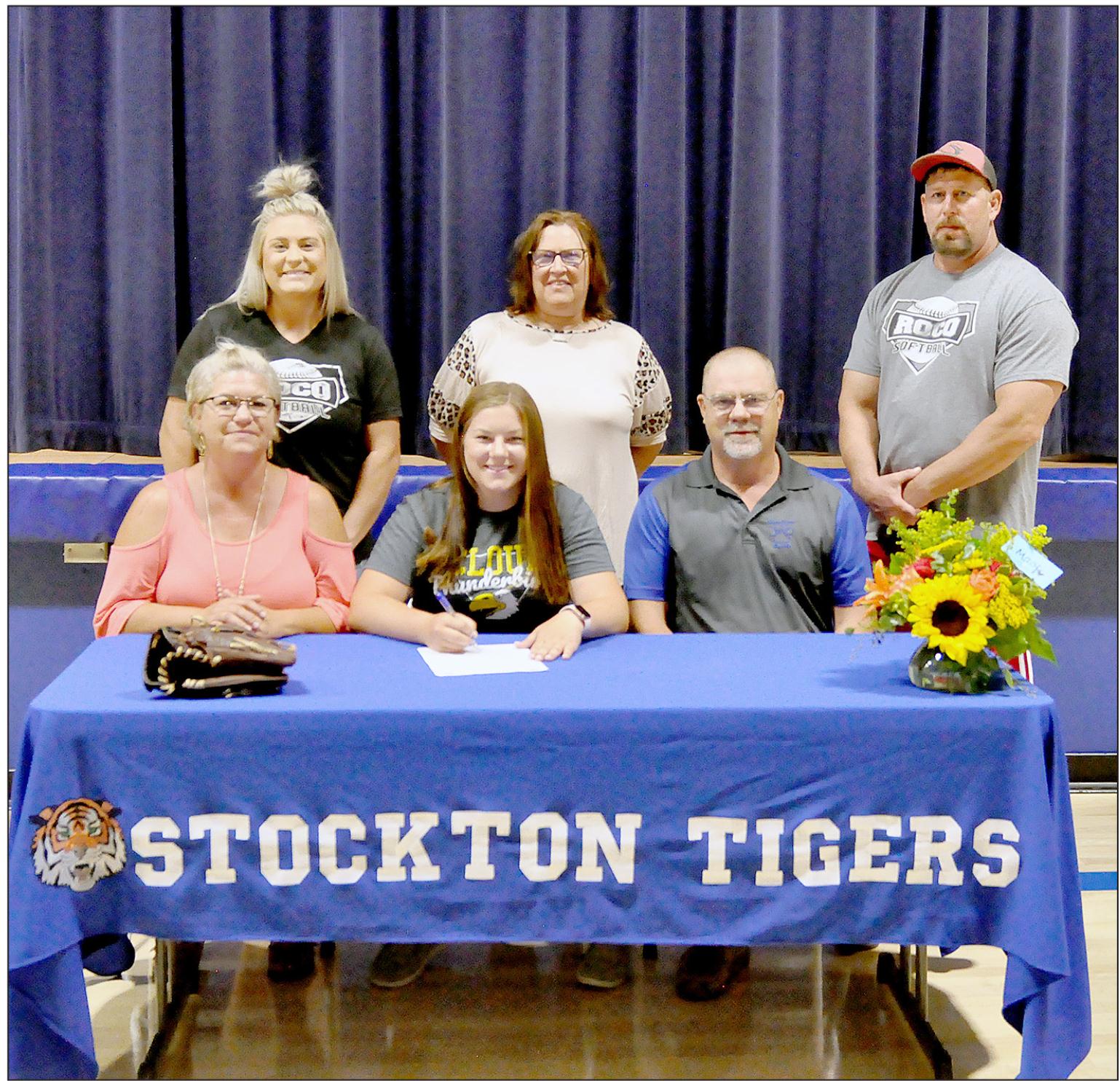 Macy Odle with coaches and AD
