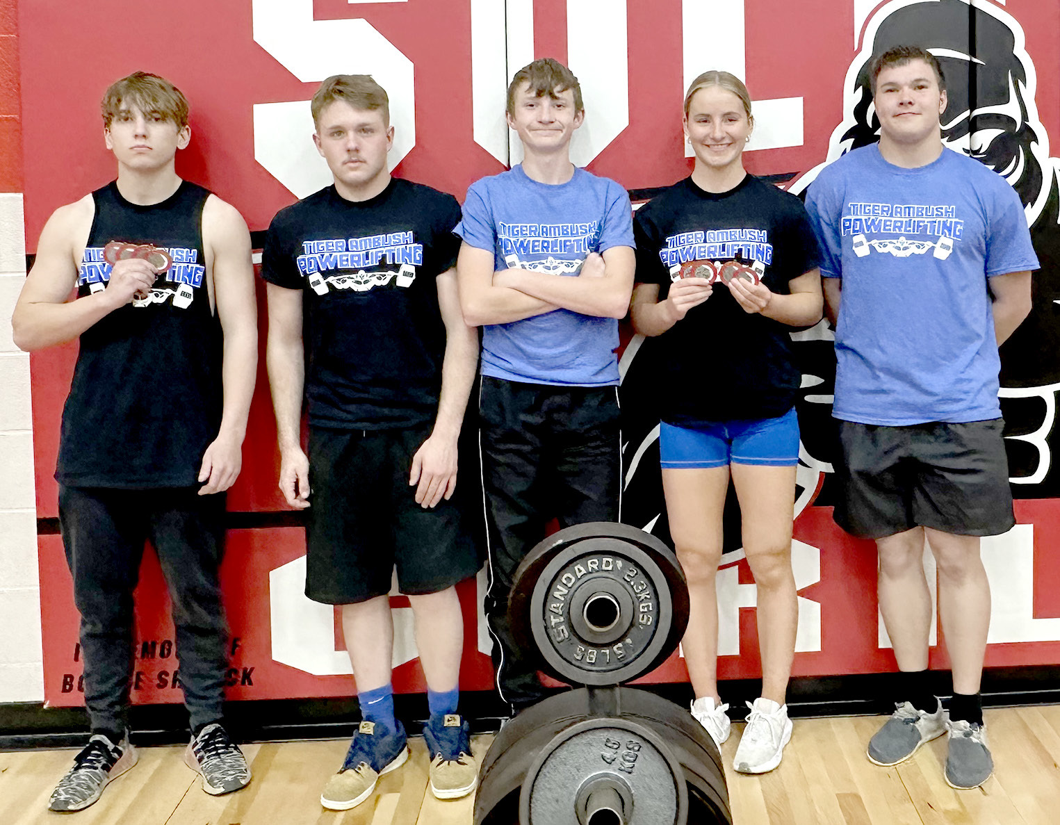 Tiger Ambush Powerlifters at Solomon—Cason Iwanski (1st Overall), Deacon Creighton, Haden Hahn, Ava Dix (1st Overall) and Zach Young
