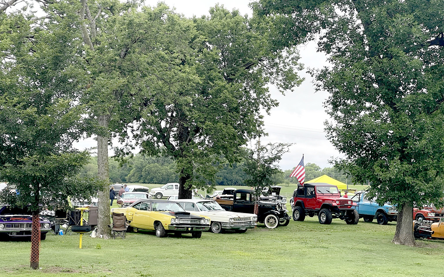 THE VINTAGE CARS were lined up under the canopy of shade trees at the Stockton City Park during the Swing Into Summer Festival Car Show held on Saturday, June 17th. Everyone enjoyed the cars, games, and vendors the event had to offer.