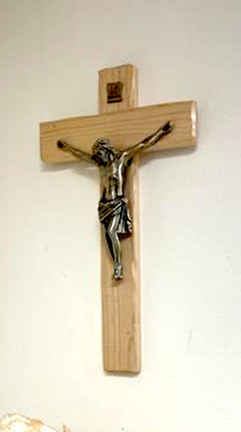 THE CROSS symbolizes Christ’s victory over death and His resurrection. The Rooks County Historical Museum several donated religious artifacts are part of its Easter display this Holy season.
