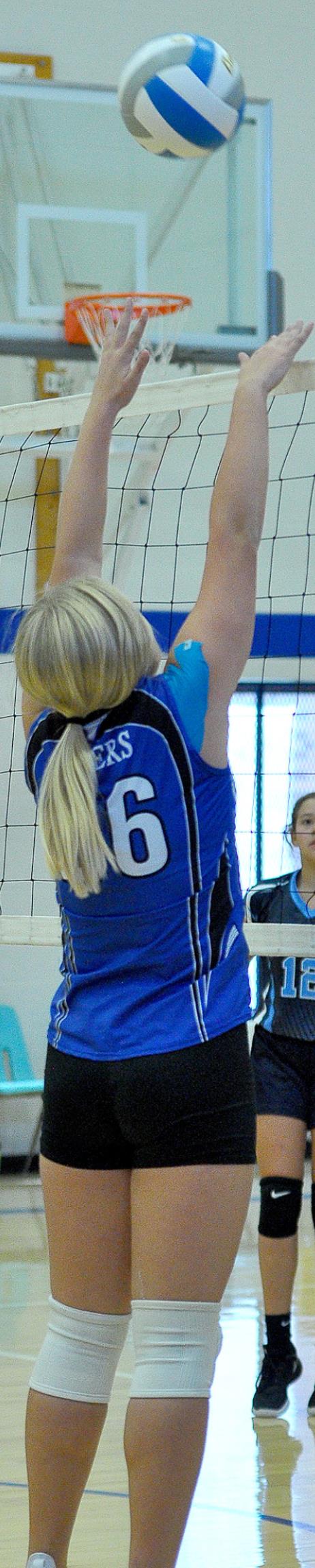 KARLEIGH HORN goes up for a block in the Lady Tigers’ game against Lucas/Sylvan on September 23.