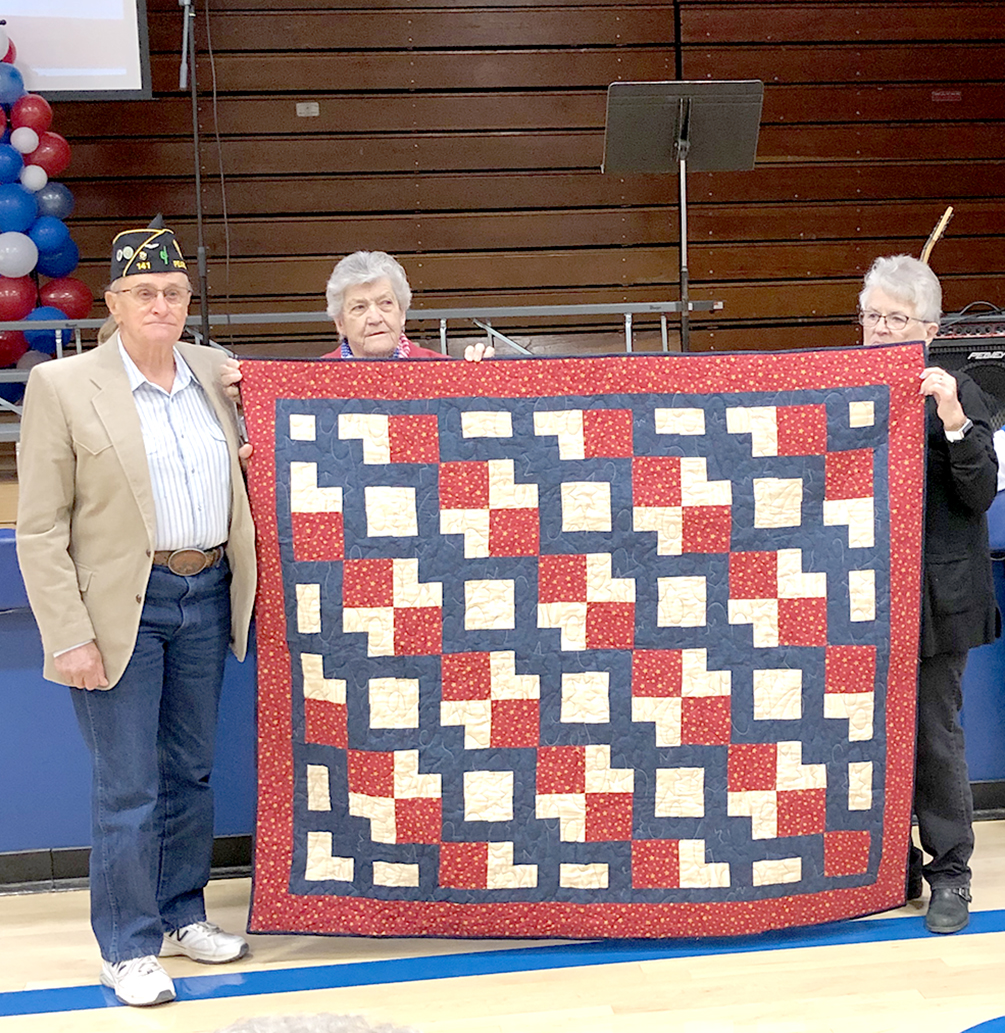 JAY MURPHY (Air Force) was presented with his Quilt of Valor by Judy Russ and Diane Maddy during the Veterans Day program held on Friday, November 11th at Stockton High School.