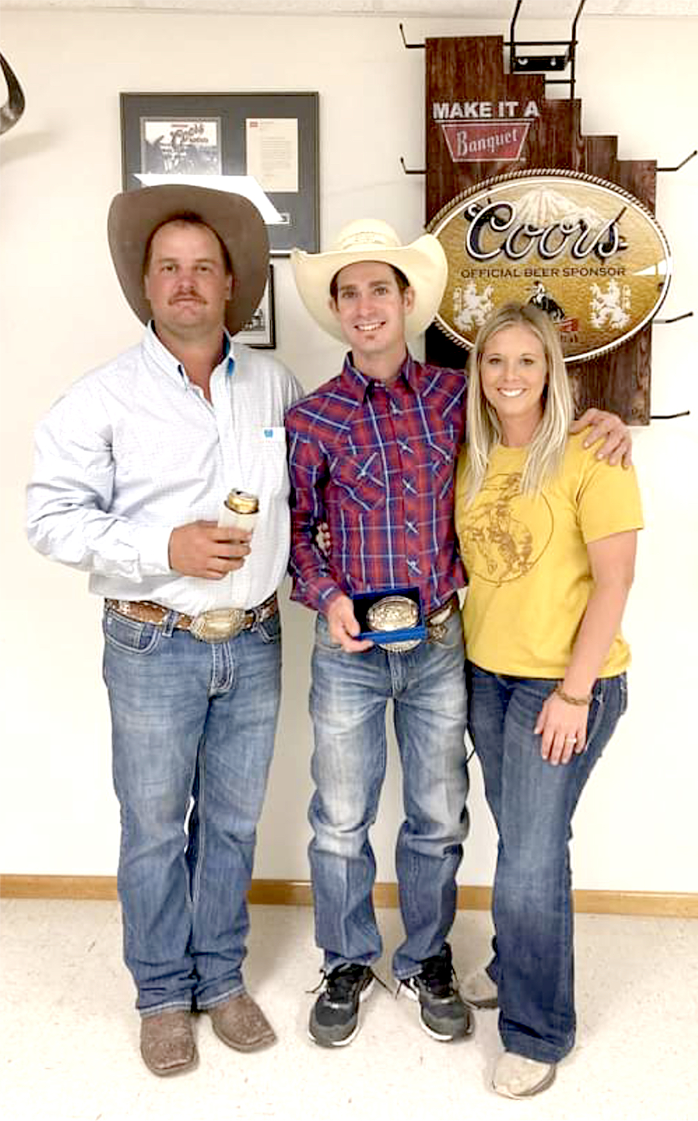 PICTURED with the bull rider champion at the Richard Schleicher Memorial Bull Riding event held on Saturday, September 24th are Trey Kerner, belt buckle winner Chase Hamlin and Jimi Kerner of Kerner Bucking Bulls, Brule, Neb.