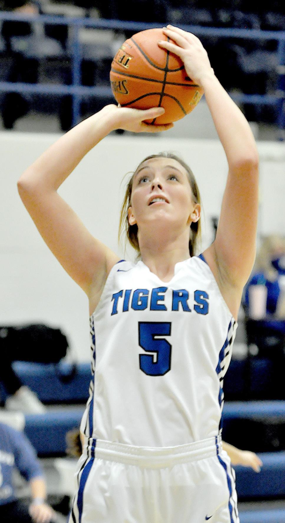 LADY TIGER JUNIOR OLIVIA DIX shoots for two during action in the Stockton vs. Norton game held last Friday in Stockton.