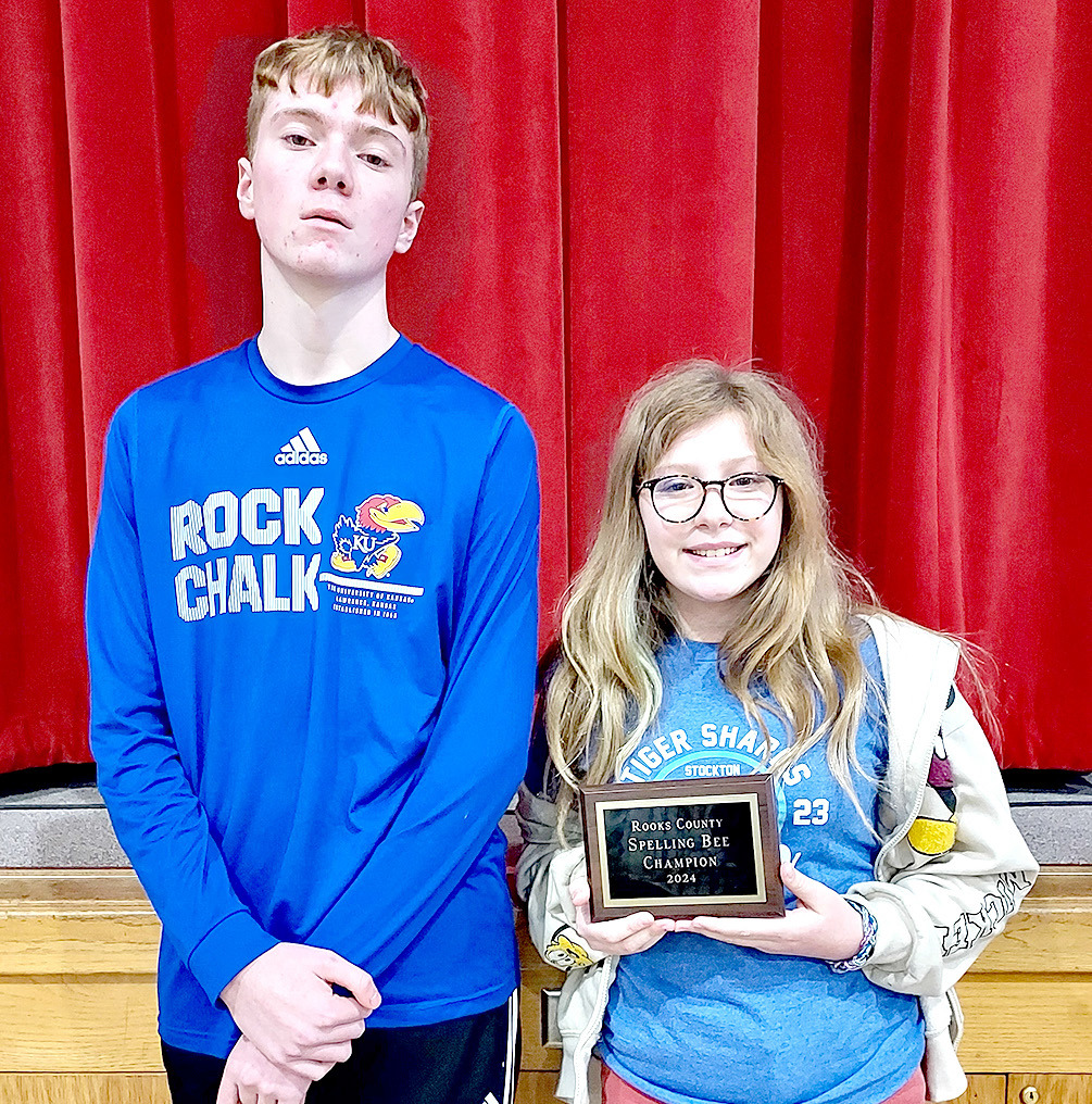 REPRESENTING ROOKS COUNTY at the State Spelling Bee in March is Stockton sixth-grade student Lyla Oller. Pictured are runnerup Cayden Klein and spelling champion Lyla Oller.