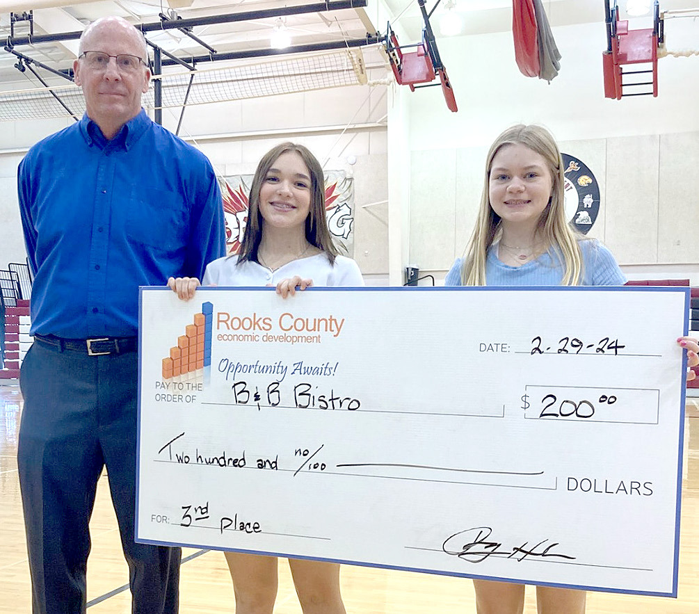 Third-Place Winners Brynlee McDowell and Brilynn Trumpp (with Roger Hrabe)