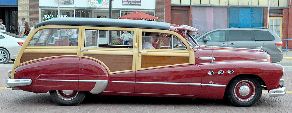 Rod and Christi Roy of Hays in their 1948 Buick Woody Wagon