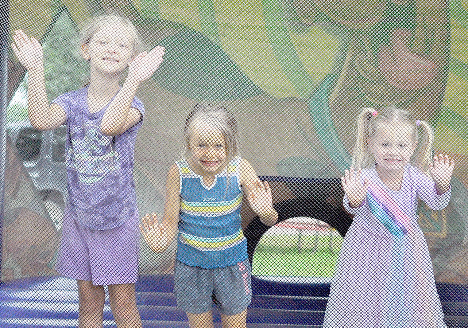 Penelope Chandler, Brynlie Kreutzer and Charity Balthazor in the Bounce House
