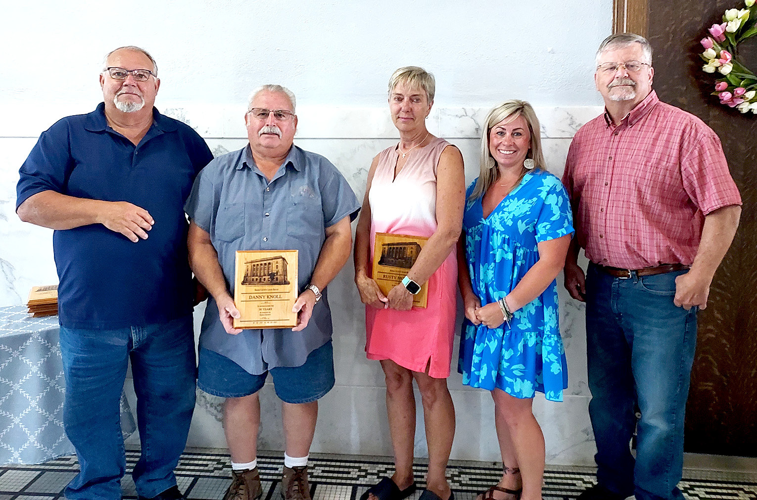 THIRTIETH ANNIVERSARY plaques were presented at the Rooks County Commission meeting held on Tuesday, May 30th. Pictured are (from left): commissioner Tim Berland, Danny Knoll, Tricia Morgan for Rusty Morgan, and commissioners Kayla Hilbrink and John Ruder. (Not pictured are Chris Lambert and Kelly Richmond. Gail Strutt was recognized for 40 years of service to the County.)