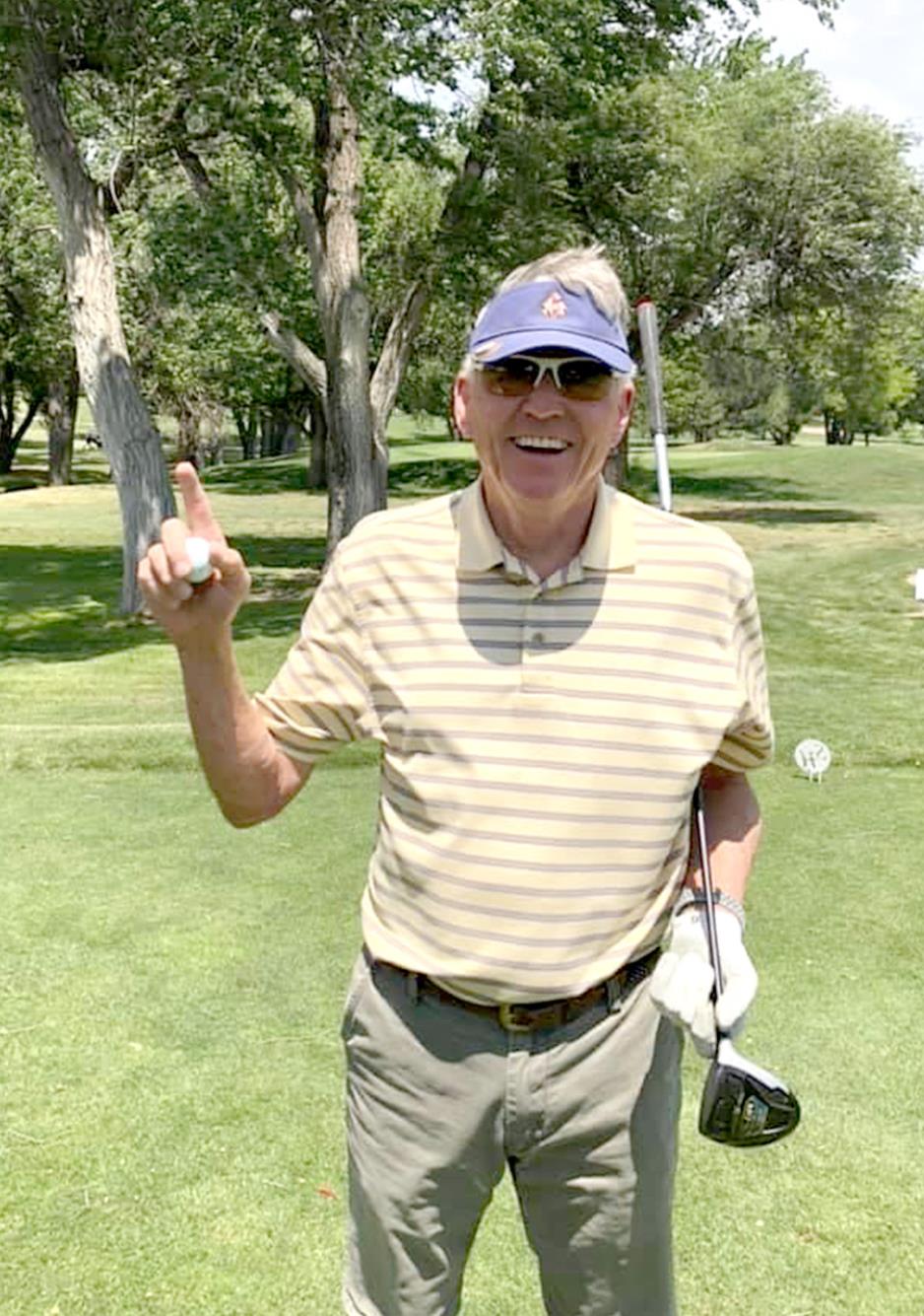 JAMES BERKLEY is all smiles after getting a hole-in-one last Sunday at Smoky Hill Country Club in Hays.