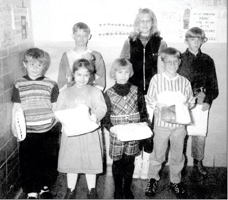 FIRST PLACE WINNERS of the Rooks County Conservation District Poster Contest in January of 1997 included (front row, from left): Butch Hamel, Kinley Kee, Lyndsey Gilmore, Brandon Frederking; (back row) Dusty Karlin, Summer Steeples, and Jordyn Wilkens. Not pictured are Jason Williams and Jessica Benoit.