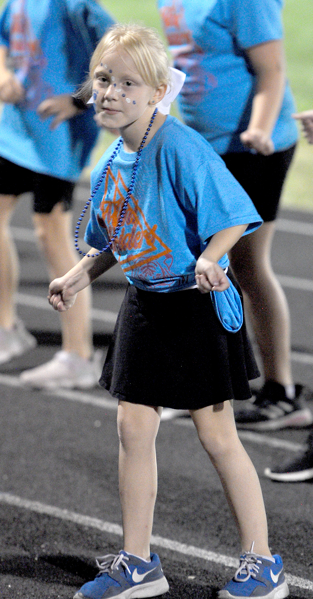 Kitlyn Snyder performing at the Hoxie football game