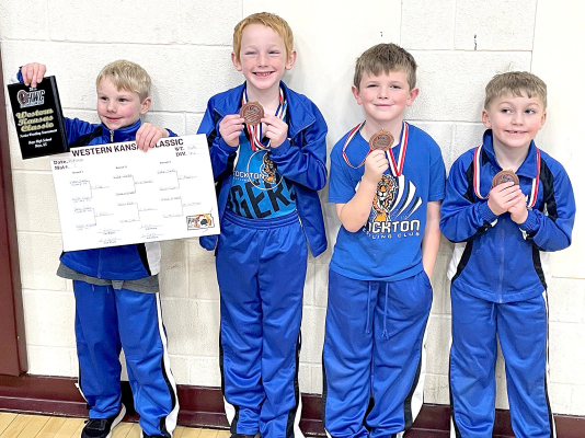 FOUR MEMBERS of the Stockton Wrestling Club placed at the Hays Novice Wrestling Tournament on December 18. From left are: Jevin Rush, 1st; Waylon Ghumm, 3rd; Grayson Brown, 3rd; and Ryder Swaney, 3rd.