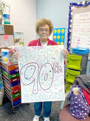 BETTY CADORET has not let a little thing like “age” keep her from doing what she loves, and that’s being with children! Betty, a Foster Grandparent at Stockton Elementary School, just turned 90 years young, and all of the students, teachers and staff signed a birthday card almost the size of Betty! Happy 90th Birthday, Betty!