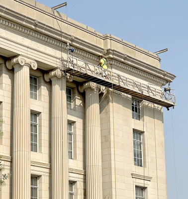 THE WORK TO THE EXTERIOR of the Rooks County Courthouse starts with a power washing of a section of the building. Jakob Stockton and Jason DePalmo are working in sections, going around the building and refreshing and repairing the building.