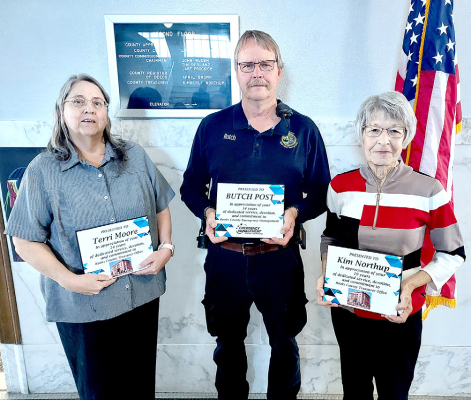 ROOKS COUNTY EMPLOYEES, treasurer employee Terri Moore (24 years), emergency management director Butch Post (14 years), and treasurer Kim Northup (18 years) were recognized at a retirement brunch held in their honor for their service to the County on Tuesday, March 26th.