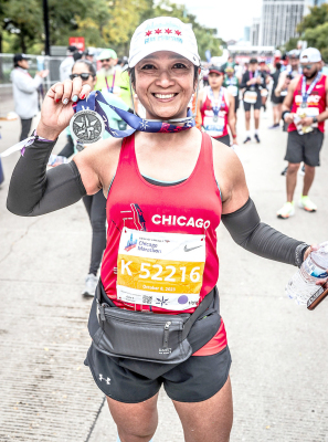FIELZAH CREIGHTON shows off her medal after completing the 26.2-mile Chicago Marathon. The event was on Sunday, October 8th.
