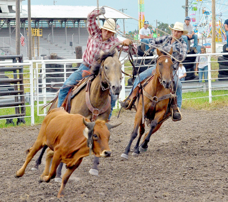 These two cowboys are in hot pursuit of the calf during action at this year’s Ranch Rodeo