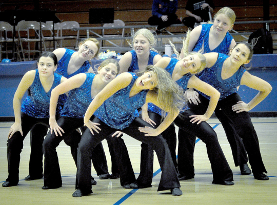 Striders dance during halftime of the Stockton vs. Tescott basketball game