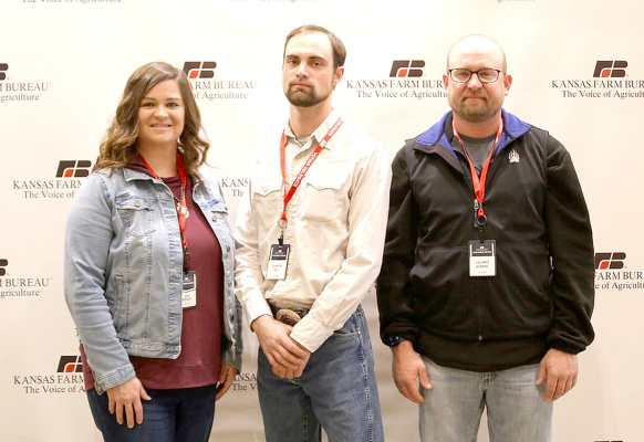 MEMBERS FROM ROOKS COUNTY joined nearly 400 Farm Bureau members of Kansas during Kansas Farm Bureau's 2022 Annual Meeting in Manhattan Dec. 3-5. Pictured here are, from left, Jess Beesley, Quinton Roy and Leland Kibbee. They elected Wilson County farmer Joe Newland as KFB president and wrapped up important business for their farm organization after debating and adopting policy statements for 2023. These policies will now become the road map for the organization during the upcoming legislative session.