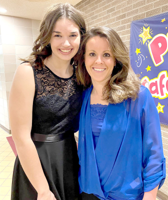 STOCKTON HIGH SCHOOL music student Aubrey Kesler, left, will be part of the District KMEA High School Honor Choir. The concert will be held this Saturday, December 3rd at Fort Hays State University. Kesler is shown with her high school music instructor, Megan Riener. (Courtesy Photo)