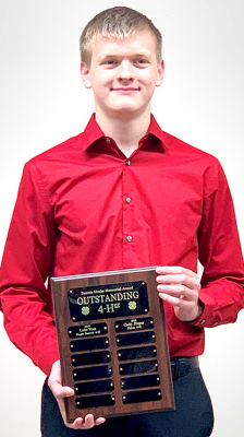LUKE VOSS (pictured), a member of the Eager Beaver 4-H Club, and Cady Pieper of Palco 4-H Club, were recognized at the Rooks County 4-H Achievement Banquet held Monday, Nov. 7, as Rooks County Outstanding 4-Hers for the Year. Luke also received the 4-H Key Award.