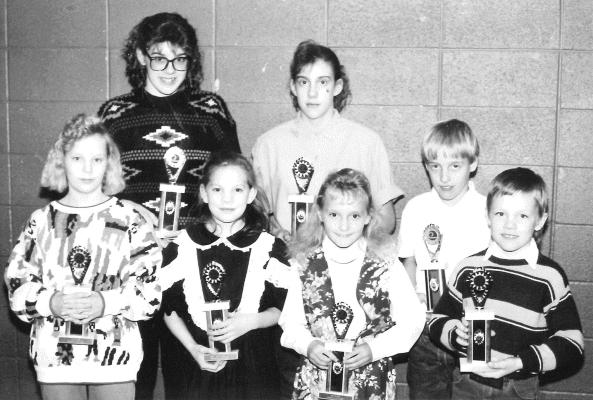 FIRST-PLACE WINNERS of the 1991 Rooks County Soil Conservation District Poster Contest were (front row, from left): Dana Balthazor, Janele Davignon, Stephanie Grecian, Austin Thayer; (back row) Jennifer Palmberg, Missy Darnell, and Ethan Gartrell.