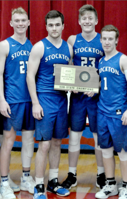 TIGER SENIORS Ben Rogers, Gage Conyac, Quinn Coffey and Trevor Miller proudly hold the Sub-State Champion plaque Stockton earned after defeating Tribune-Greeley County last in Russell.