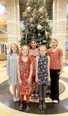 THE STOCKTON ELEMENTARY MUSIC STUDENTS who were part of the KMEA Honor Choir and performed at Fort Hays State University on Saturday, December 3rd were (front row, from left): Kaylee Jackson, Jade Jackson; (back row) McKenna Horn, Adrienne McCoy and Lyllyn McNulty. (Not pictured Kinley Kester.)