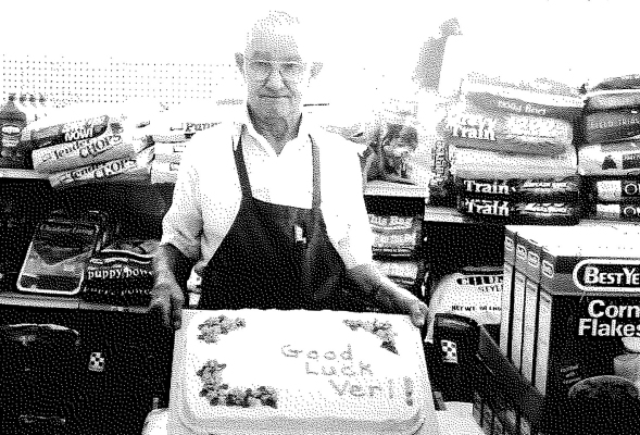 VERL MADDY is pictured with his retirement cake, which honored him on his last day of work at Webster’s Supermarket in July 1981. Verl was employed at the store for over 20 years.