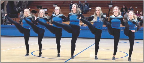 STRIDER MEMBERS performing a dance routine during halftime of the Stockton vs. Ellis basketball game are, from left: Claire Plumer, Delanee Bedore, Ella Snyder, Tierra Yohon, Karleigh Horn, Ava Dix and Saj Snyder.