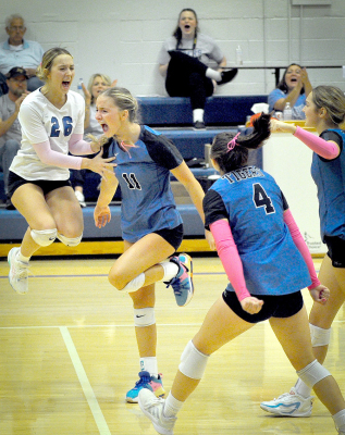 THE LADY TIGERS had many reasons to celebrate during the finals of the sub-state tournament against Rawlins County, but in the end the fell to the Lady Buffaloes in two very close sets. From left are: Claire Plumer, Ava Dix, Bodye Stithem and Breckyn Williams.