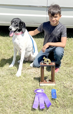 IN HIS FIRST YEAR OF SHOWING, Jefferson Creighton and Lucy, won the High Point on Lead Agility trophy, a Purple Champion ribbon, and a Blue ribbon at the Rooks County Free Fair. Awesome job, Jefferson and Lucy!