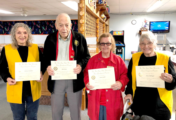 AMERICORPS SENIOR VOLUNTEERS recognized November 16 at 183 Lanes in Stockton included the following: from left: Senior Companion, Molene Hartzler, Stockton, 8 Years of Service; Foster Grandparent, Glen Buss, Stockton, 6 Years of Service; Foster Grandparent, Rose Smith, Stockton, 11 Years of Service; and Senior Companion, Mary Billinger, Plainville, 5 Years of Service. (Photo Courtesy of Jessica Shank)
