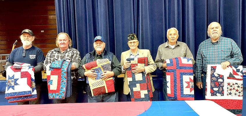 THE SIX VETERANS who were presented with Quilts of Valor for service to their country at the Veterans Day program held at Stockton High School on Friday, November 11th were (from left) Scott Baker, Randall Peacock, Roland Johnston, Jay Murphy, Bob Hamilton and Gerald Wehrli.
