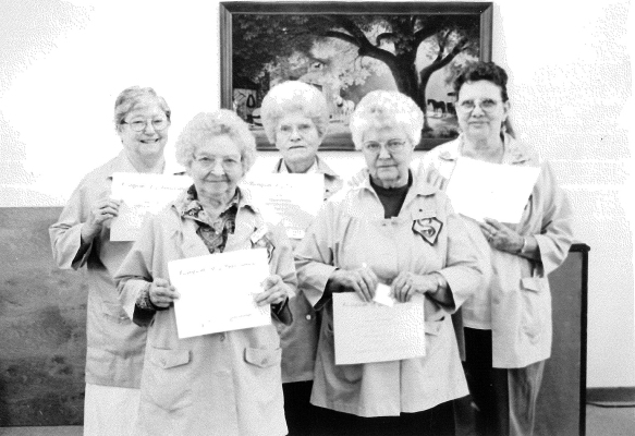 SENIOR COMPANIONS who were recognized in September of 1997 for their services were (front row, from left): Famy Fry, Lois Glendening; (back row) Ruby Bedore, Virginia Saunders and Juanita Spore.