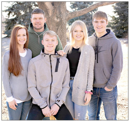 DAVID HAD A STRONG LOVE for his family which consisted of (from left) his high school sweetheart Rhonda, son Ben, daughter Madison, and son, Troy.