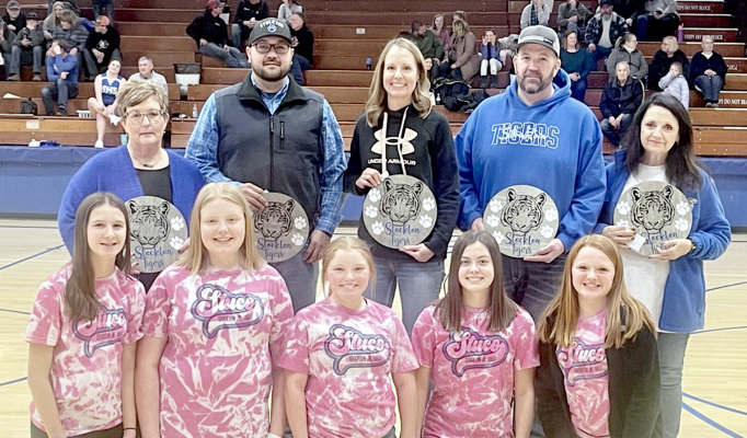 DURING SCHOOL BOARD APPRECIATION MONTH, Stockton School Board members were recognized at the January 31st home basketball game. Pictured are (front row, from left): Stuco officers Meredith Gasper, Brenna Odle, Aidyen Kerr, Camille Lowry, MaKenna Horn; (back row) board members Stephanie Niblock, Jesse Stithem LeAnn Dix, Chad Sterling, and Thelma Berland.