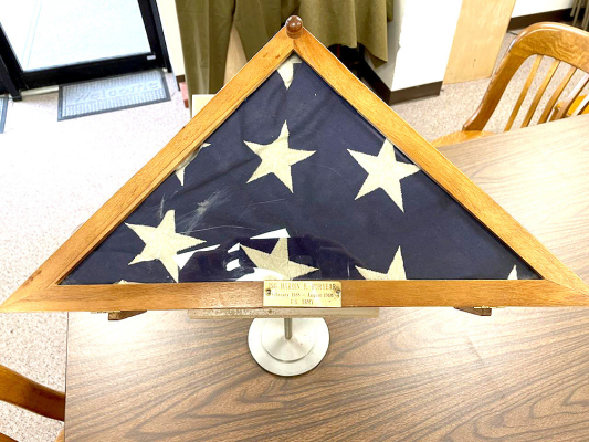 THE ENCASED FLAG was donated to the United Methodist Thrift Shop, who brought it to the Rooks County Historical Society to find a home for the flag. After researching it, the Museum found and contacted the family of the late Korean War veteran in Texas, and the honor flag was shipped home.
