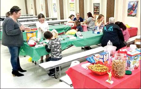 Decorations made of candy, marshmallow, frosting and more were generously applied to all the “gingerbread” entries fashioned by several families at the Gingerbread Family Night on December 5th, sponsored by Stockton Rec.