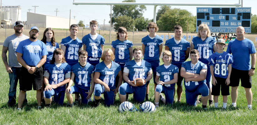 MEMBERS OF THE 2022 STOCKTON HIGH SCHOOL FOOTBALL TEAM are kneeling, from left: Donovan Gosa, Cameron Balthazor, Deacon Creighton, Jaxon Dunlap, Hayden Hilbrink, Ryan Mongeau; and standing, from left: Spencer Hilbrink (assistant coach), Heath Muir (assistant coach), Shyanne Balthazor (manager), Preston Chandler, Jack Gasper, Emerson Lowry, Max Moffet, Zach Young, (Taylor Inglsbee), Beckem Hilbrink (manager) and Don Moffet (head coach). Not pictured are Skylar King and Jesse Dunlap (assistant coach).