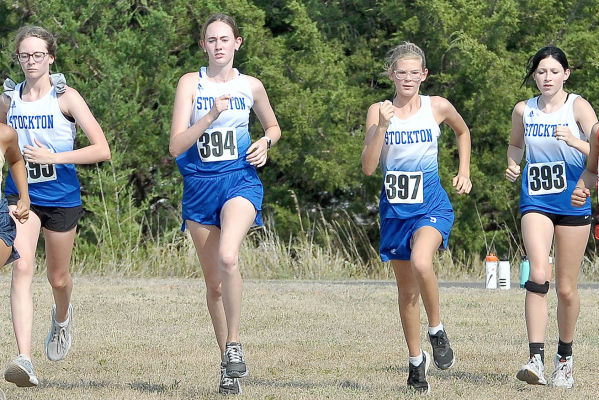 STOCKTON HIGH SCHOOL Lady Tigers Cheyenne Hoeting (second from left), Cappi Hoeting, Ariel Sager and Ryleigh Gardner take the first steps of the 5K varsity girls cross country race at Webster State Park on September 8. The girls placed first as a team.