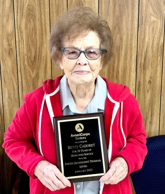AMERICORPS SENIOR VOLUNTEER Betty Cadoret, Stockton, received special recognition and a plaque for 20 years of serving Rooks County during AmeriCorps Week.