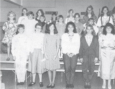 PICTURED ARE THE PURPLE RIBBON WINNERS of the 1991 4-H Style Review. They are (from left, front row): Bobbi Meitler, Jamie Meitler, Mari Jo Stout, Beth Bigge, Mindy Towns, Jodie DeBey; (second row) Randi Meitler, Jenny Poore, Abigail Jakoplic, Libby Hrabe, Shannon Lowry, Mandy Kraushaar; (back row) Monica Lowry, Stephanie Lowy, Diana Stout, Nicole Thayer, Kara Stremel, Jenna Stout, and Raina Jakoplic.