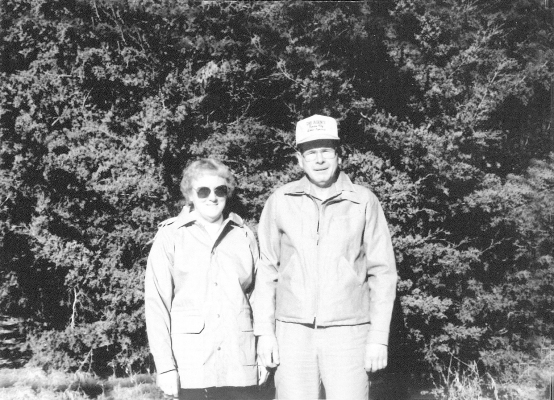 BETTY AND LARRY LALA received the 1990 Kansas Bankers Association Windbreak Award. The Lalas started the windbreak by planting twin rows of Eastern Red Cedar in 1957. They added another row along the north side of their property in 1971. The windbreak was designed to provide winter protection for the livestock and added defense for the entire farmstead area.